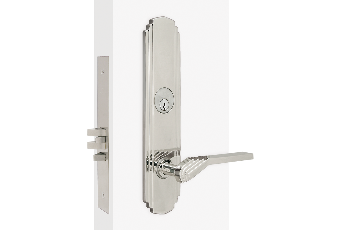The trim that encapsultes the lock appears to have a organ-like appearance at the top and bottom. The lever used on this trim matches because of the steps it has before reaching the strim. Both are very straight with edges and faces.