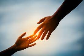 hands reaching out to help each other